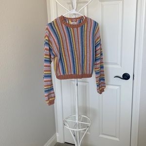 Billabong Multi colored stripe sweater .  Size Small.